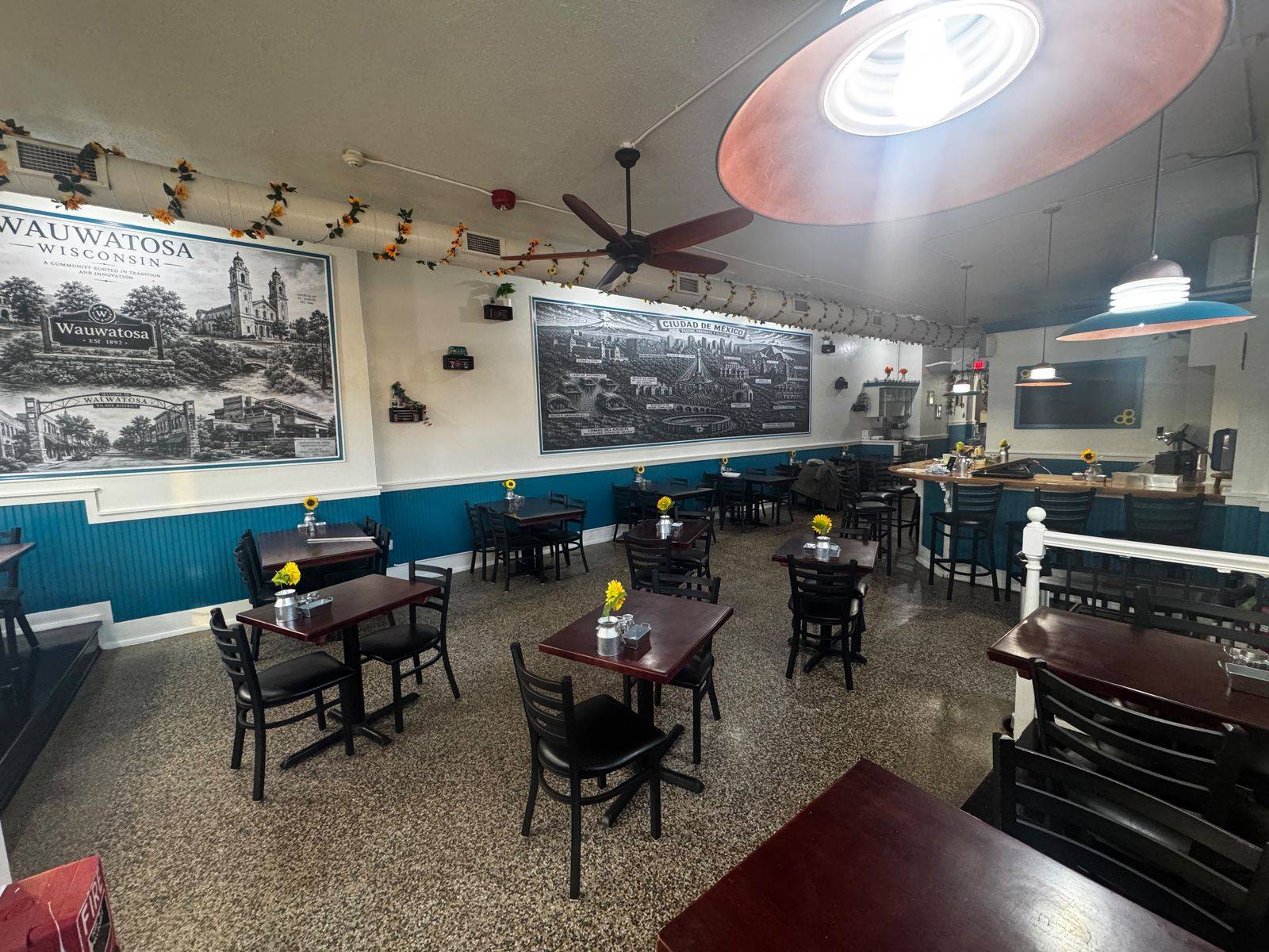 Dining room with Mexico City and Wauwatosa murals