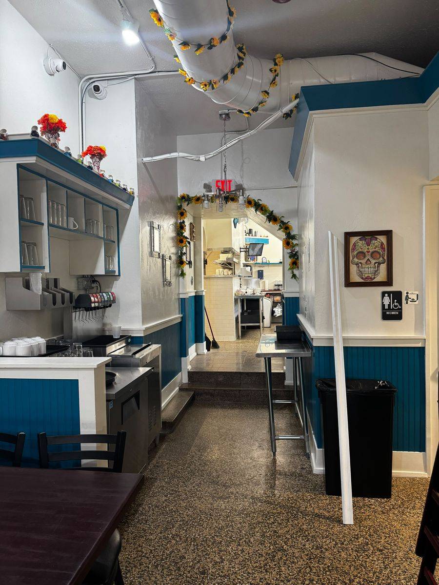 Sunflower archway leading to the kitchen